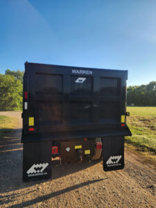 Durable 1" Warren pintle plate and 50-ton hitch for Peterbilt trucks.