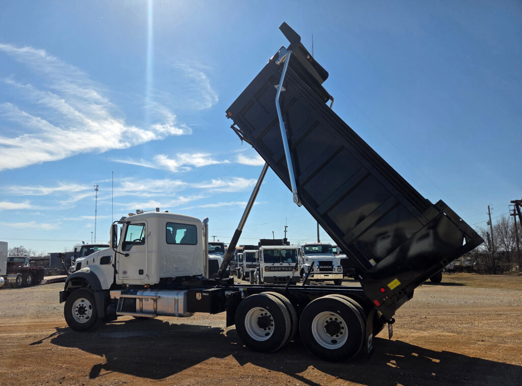 Mack dump truck equipped with Warren Crossmemberless Bed in Flower Mound
