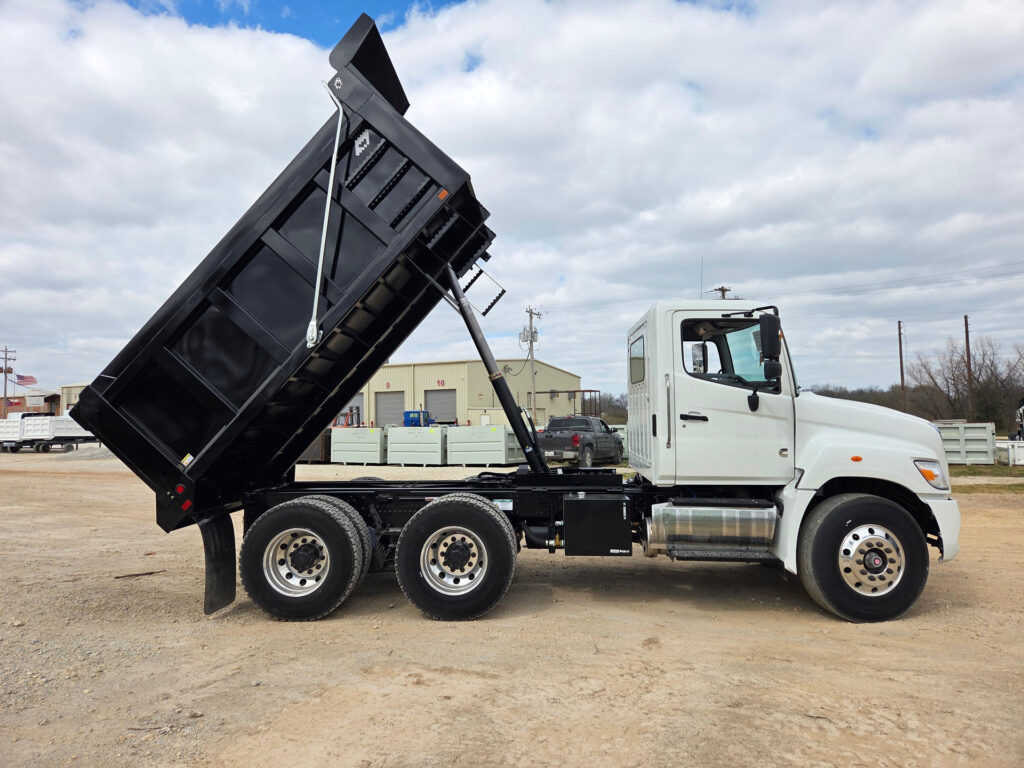 HINO truck shortened over eight feet with Warren frameless 13 foot dump bed installed