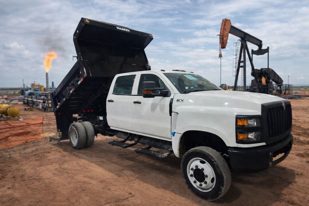 International pickup truck equipped with Warren U-9 dump body 9 foot underbody dump setup